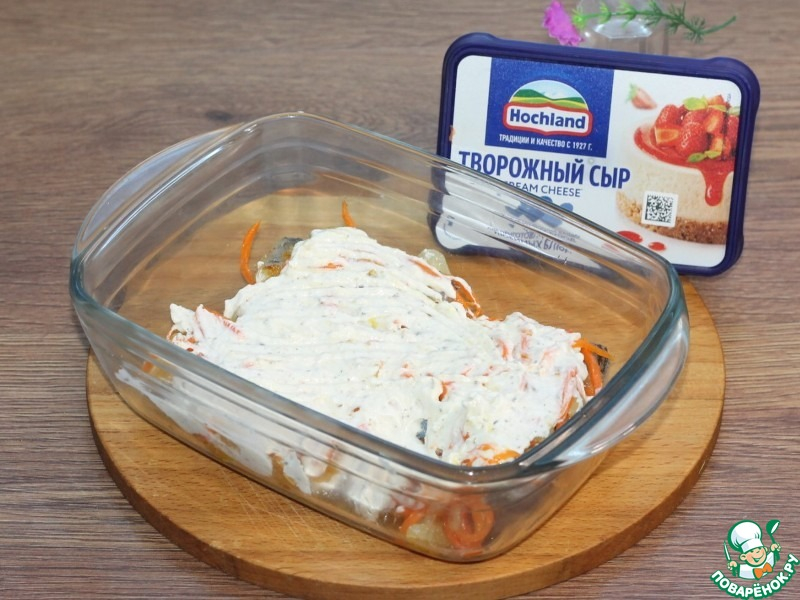 Минтай под шапочкой с сырным соусом